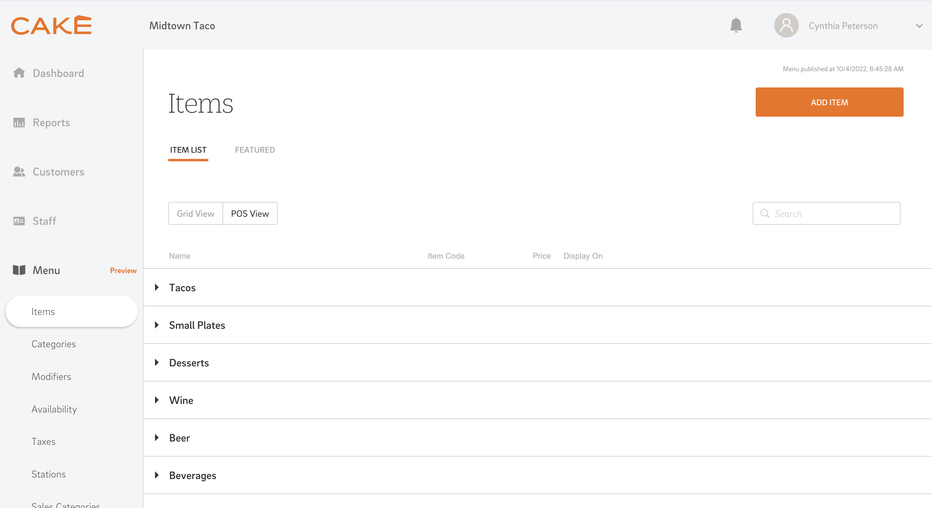 A screenshot of the CAKE POS admin portal, showing a customized menu for a Mexican restaurant with a list of items like tacos and burritos.